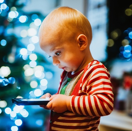 Kid boy phone 2025 pixabay christmas-wallpaper-5871185_1280 cropped